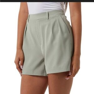 Calypso St. Barth High-Waist Pleated Shorts in seafoam green